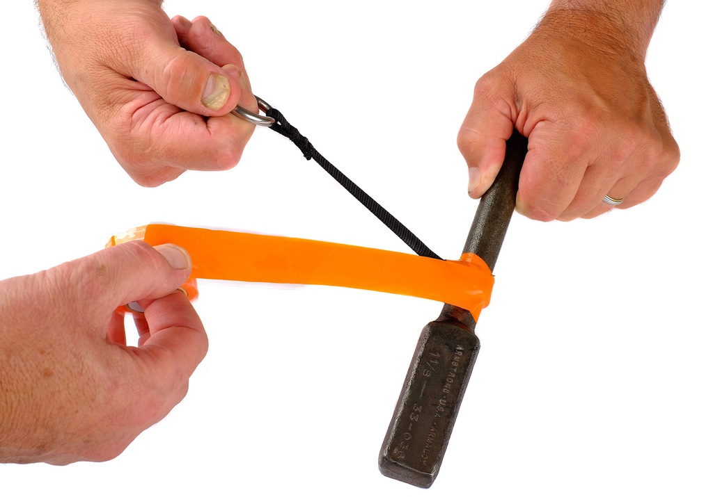 Forstærket selvklæbende silikone tape til brug med værktøjs stropper