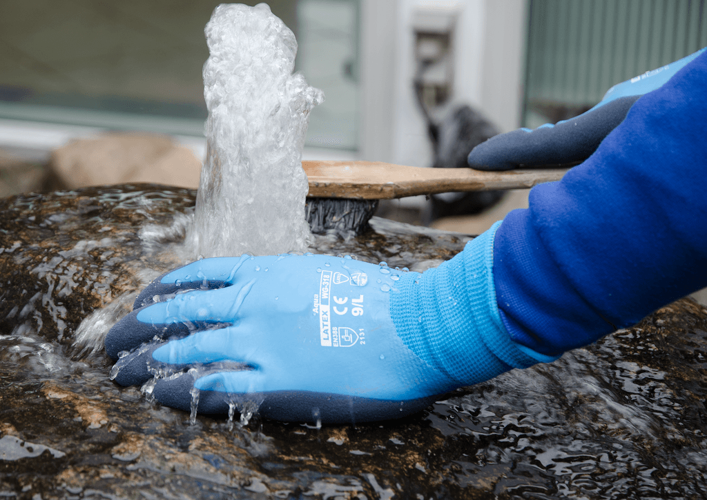 Wondergrip WG-318 blå montering handske, i naturgummi (latex), praktisk rib manchet, samt en ru gribeflade længde 260 mm
